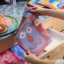 Wrap Tea Towel - Making Faces - Blue / Brown