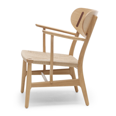 Carl Hansen CH22 Lounge Chair oak side